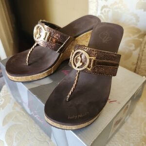 Baby Phat Bronze wedge sandals size 7 avg wear.